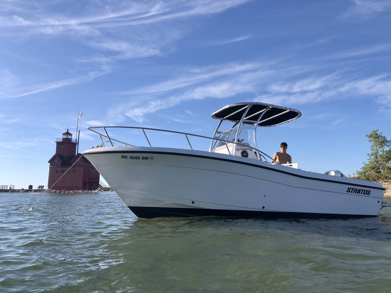 1999 Stratos 2100 CC with a SG300 boat t-top, photo 1 of 3