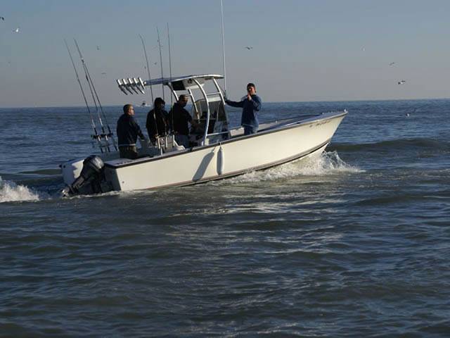 1989 SeaCraft 23' with a SG300 boat t-top, photo 1 of 6