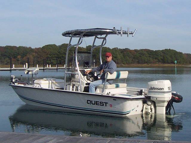 1995 Quest Bay Boath with a SG600 boat t-top, photo 1 of 2