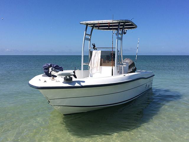 1999 Angler 180 with a SG300 boat t-top, photo 1 of 2