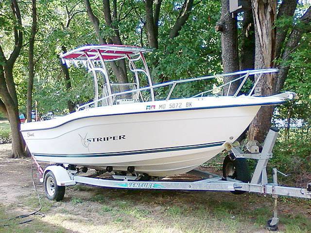 2000 Sea Swirl Stiper with a SG600 boat t-top, photo 1 of 2