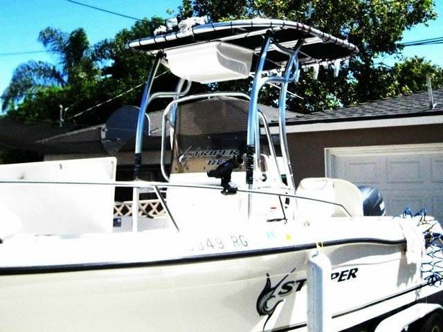 2005 Sea Swirl Striper 1851 Center console with a SG600 boat t-top
