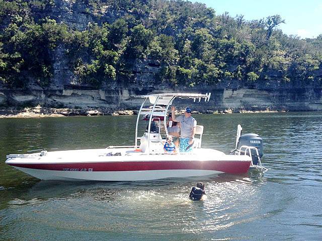 2006 NauticStar Nautic Bay 2200 with a SG300 boat t-top, photo 1 of 4