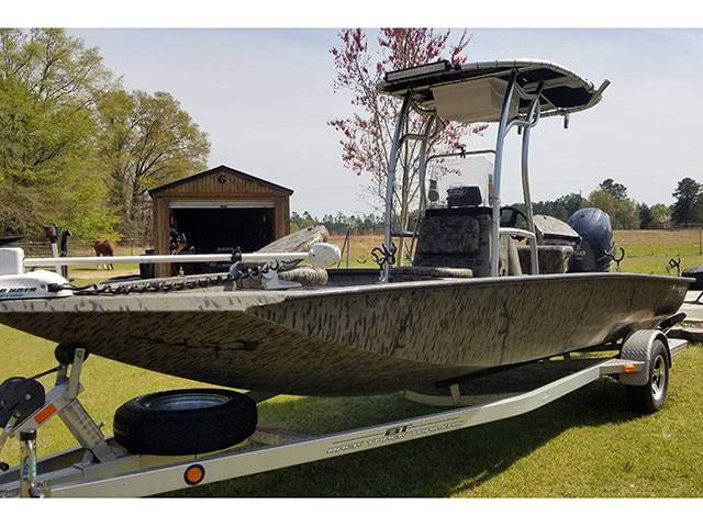 2012 Xpress H20 Bay with a SG600 boat t-top, photo 1 of 2