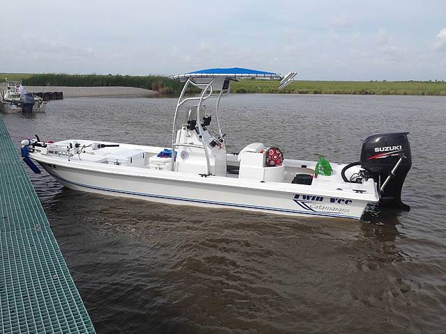 2014 Twin Vee Bay Cat 22' with a SG600 boat t-top, photo 1 of 8