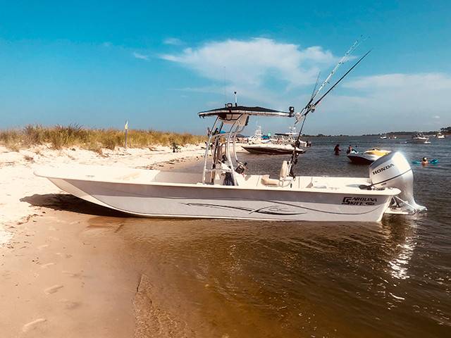 2018 Carolina Skiff 258 DLV with a SG600 boat t-top, photo 1 of 4