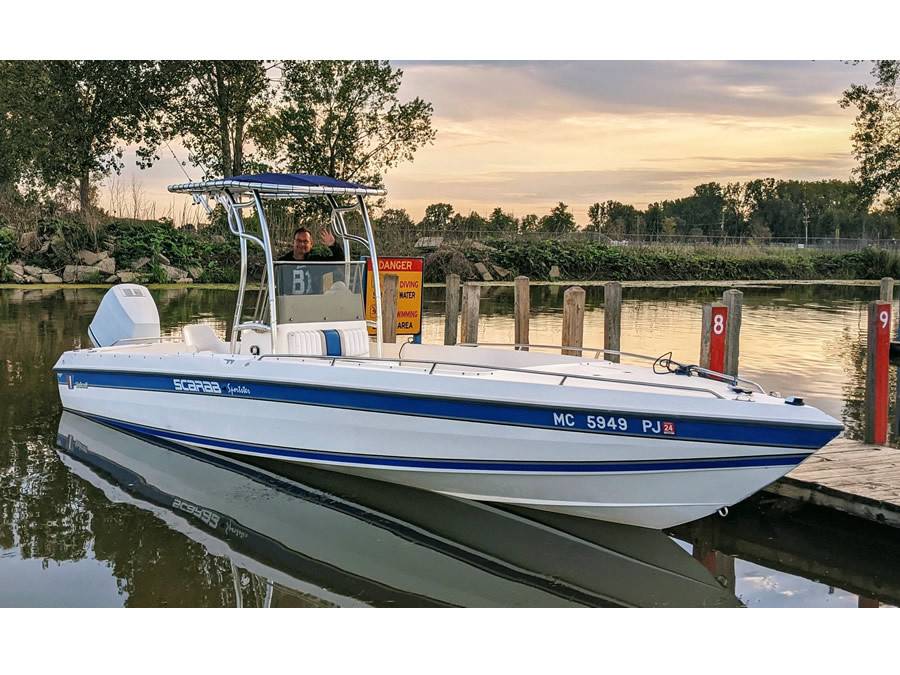 1992 Scarab Sportster with a SG600 boat t-top, photo 1 of 4
