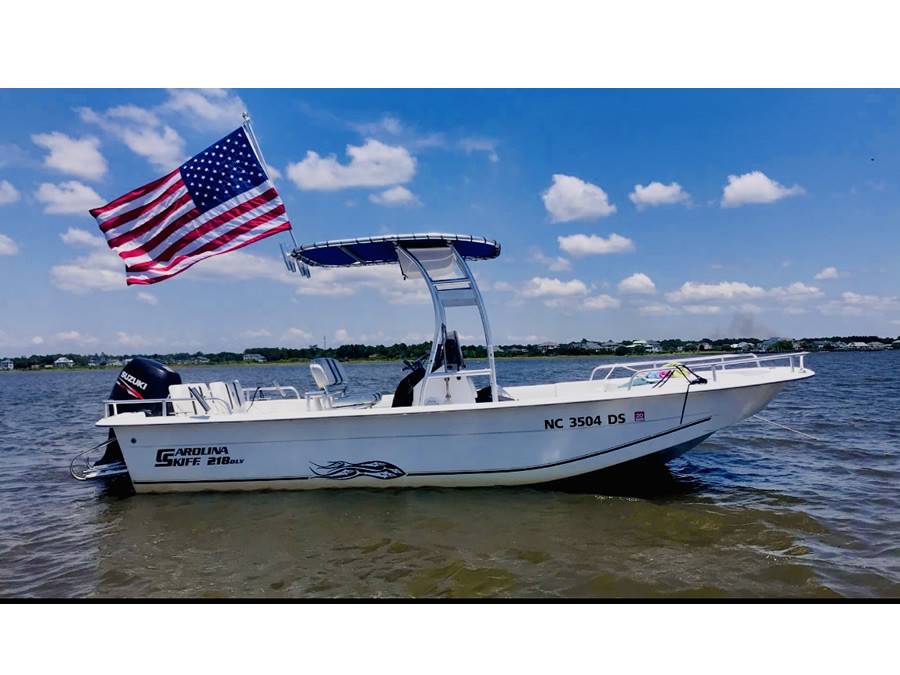 2011 Carolina Skiff 218 DLV with a boat t-top, photo 1 of 2